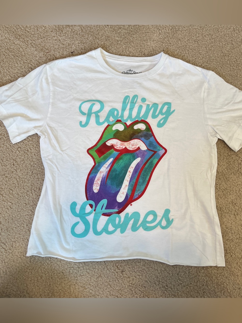 the Rolling Stones White Tee with Turquoise Script and Multicolor Tongue